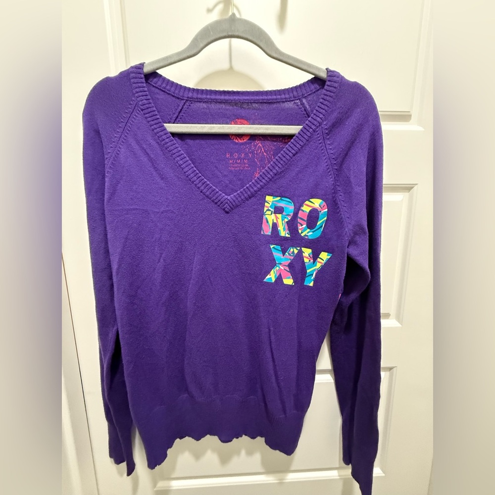 Roxy. Purple V-Neck Sweater. Size Medium.